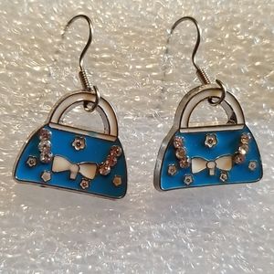 Blue and bling purse pierced earrings.